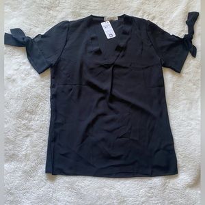 Sheer black flowy top with cute bow sleeves size Medium